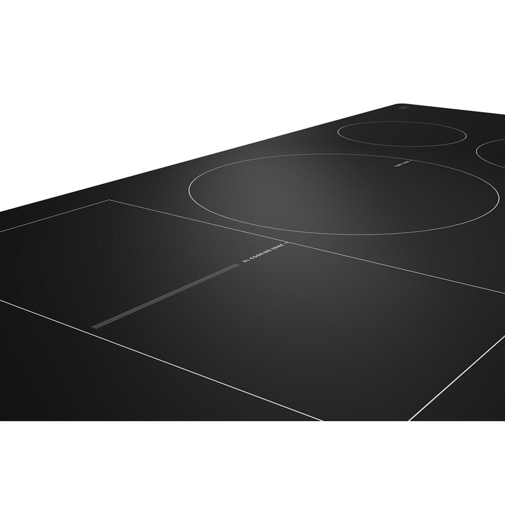 Black induction cooktop with multiple cooking zones and sleek glass surface from Induction Cooktops collection