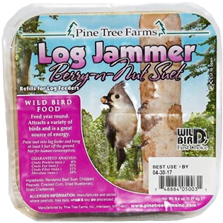 Square block of suet bird food with label featuring birds and woodland imagery for wildlife feeding.
