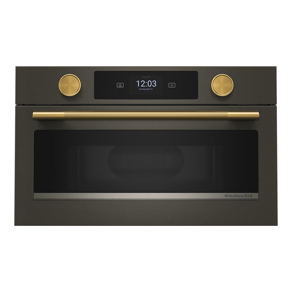Matte black built-in microwave with air fry, gold-tone handle and knobs, digital display in KitchenAid Appliances collection