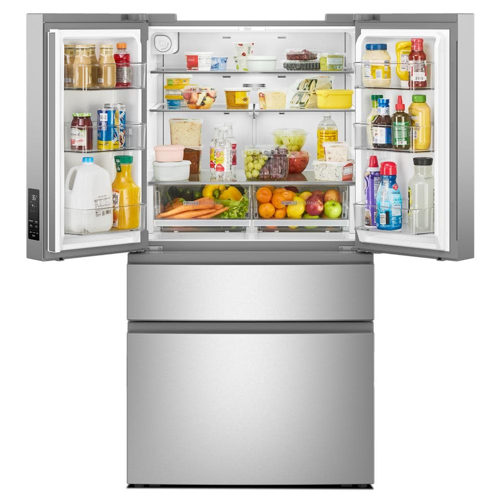 Open stainless steel French door refrigerator with organized shelves stocked with fresh produce and beverages in kitchenware collection