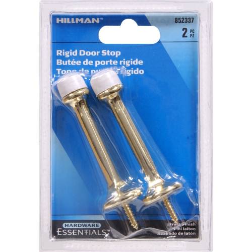 Pair of brass rigid door stops with white rubber tips for door and wall protection in hardware and door accessories collections