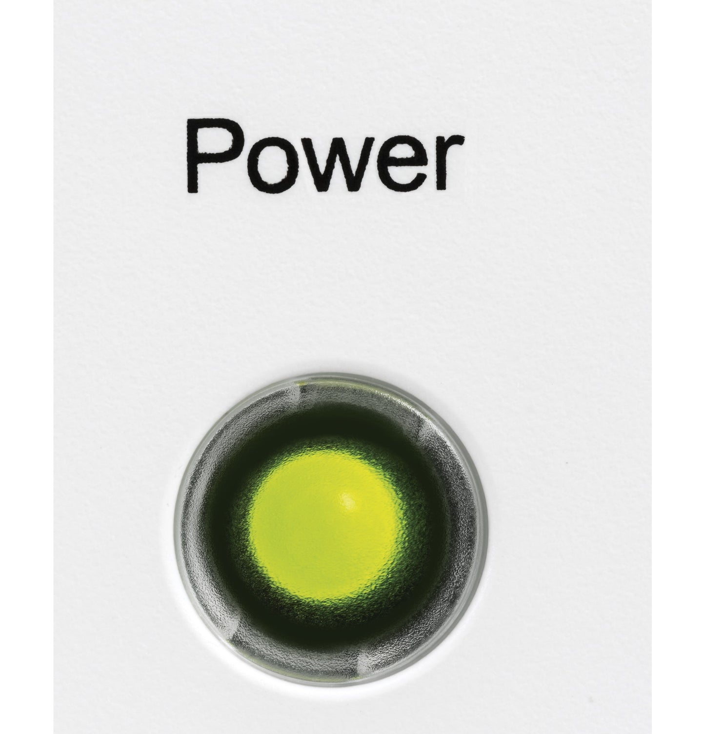 Close-up of illuminated green power light on white surface of kitchen appliance in freezers and home improvement category