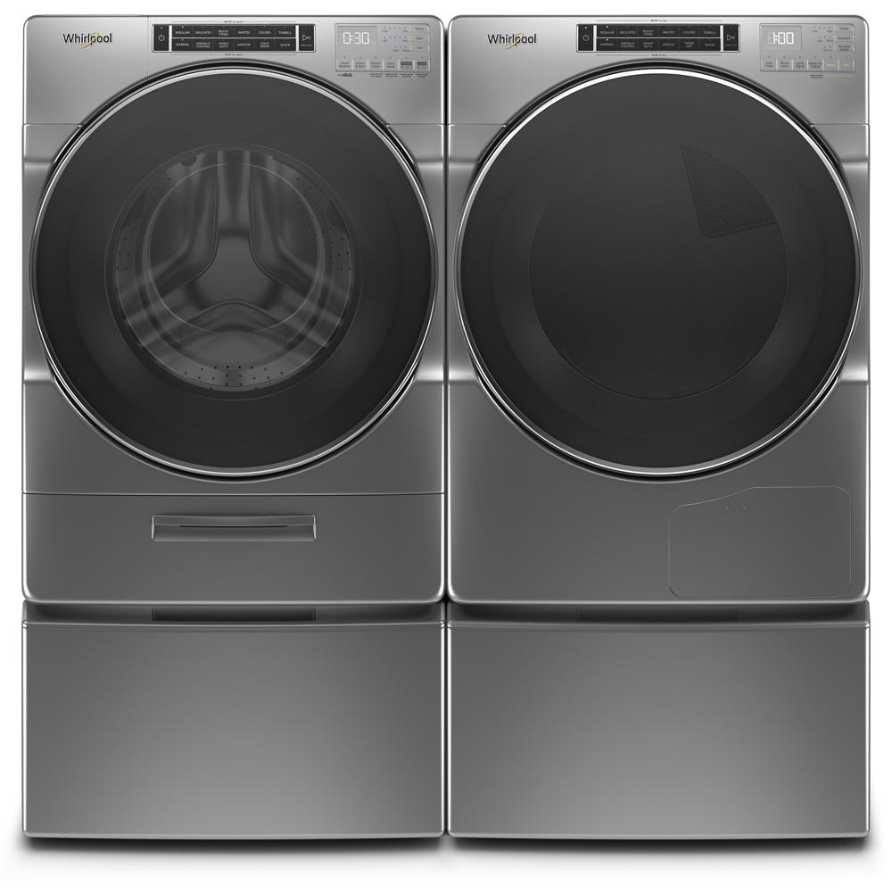 Pair of silver front load washer and dryer set on matching laundry pedestals with storage in appliance parts and accessories collection