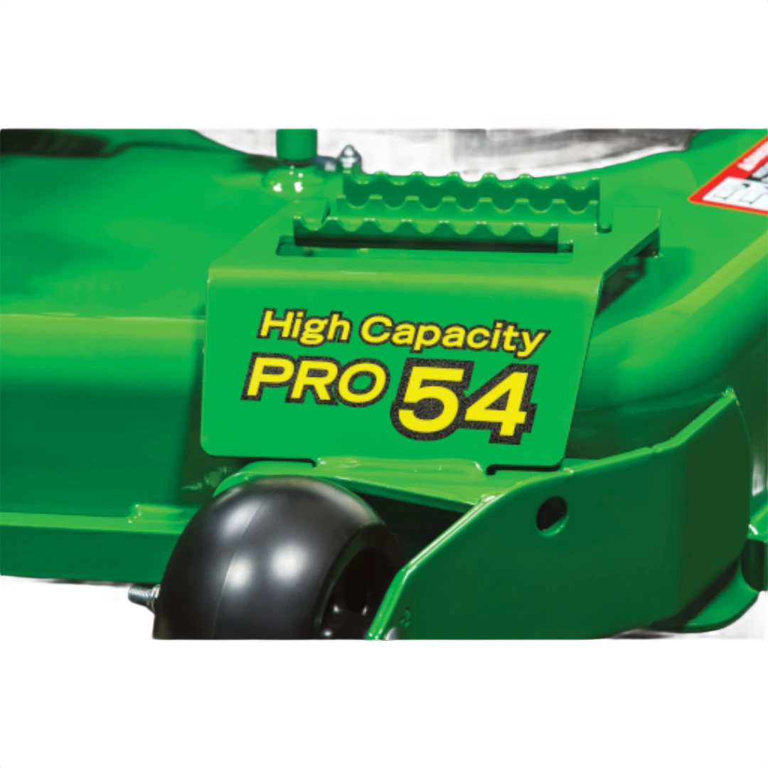Green lawn mower deck with "High Capacity PRO 54" label and black caster wheel for home improvement tasks