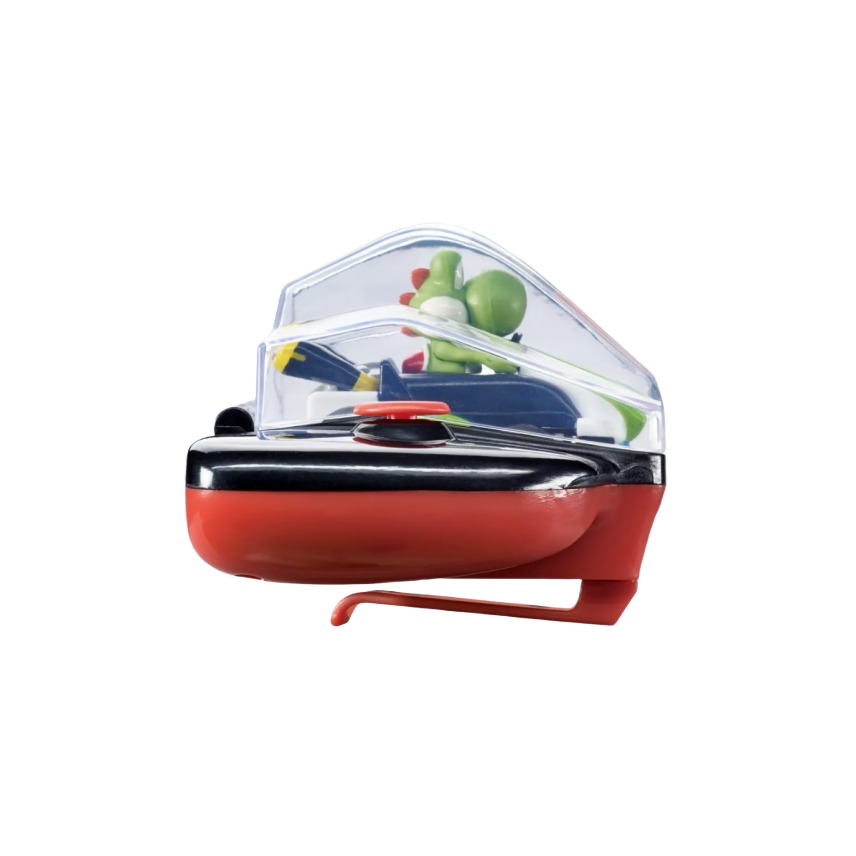 Green Yoshi figure seated inside a compact red and black mini remote control vehicle with clear cockpit cover