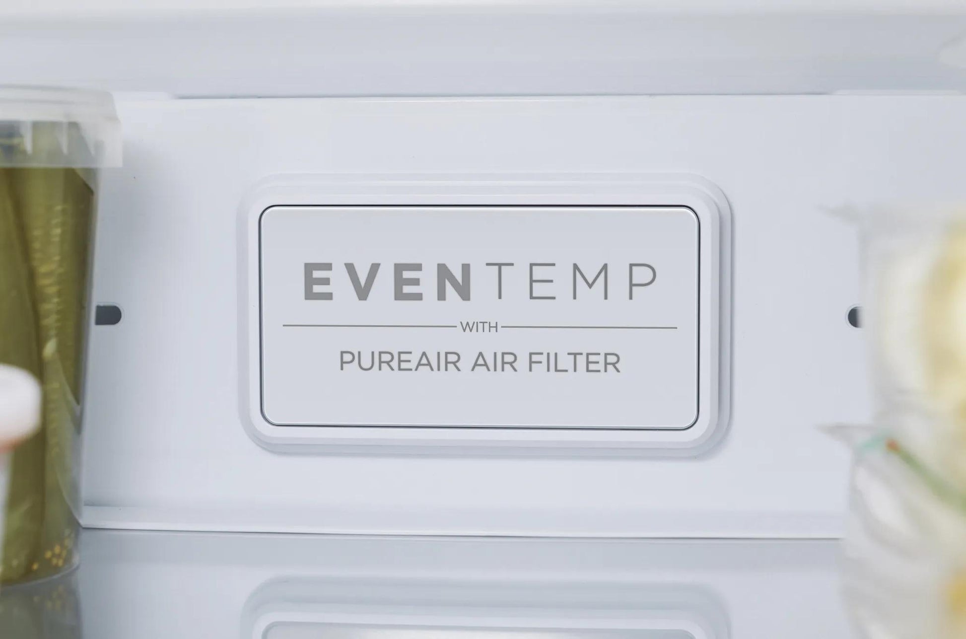 Close-up of even temperature control panel with PureAir air filter inside refrigerator interior compartment