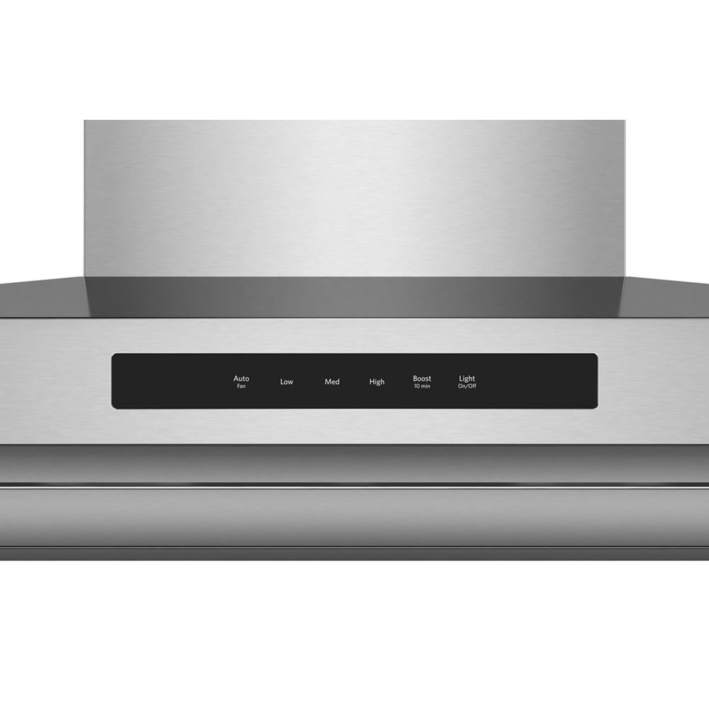 Stainless steel wall-mount range hood control panel with four-speed fan settings and power boost in KitchenAid appliances collection