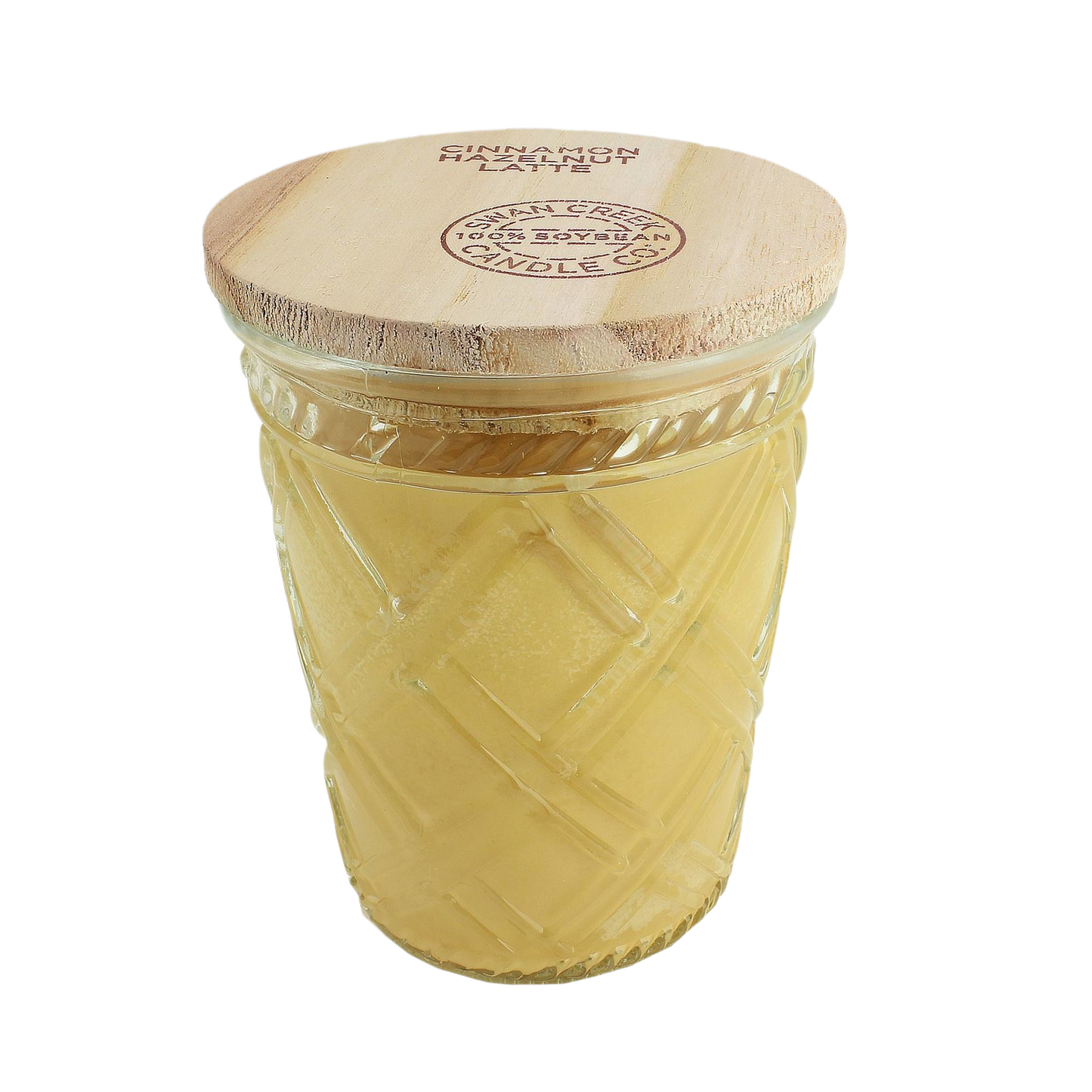 Decorative glass jar candle with wooden lid featuring cinnamon hazelnut scent in warm yellow wax