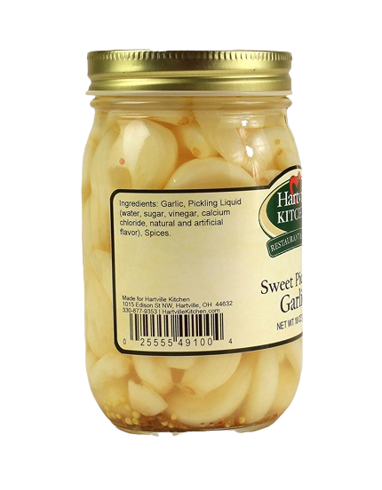 Clear glass jar of pickled garlic cloves with gold lid from Hartville Kitchen preserved goods in Fruits & Vegetables collection under $50