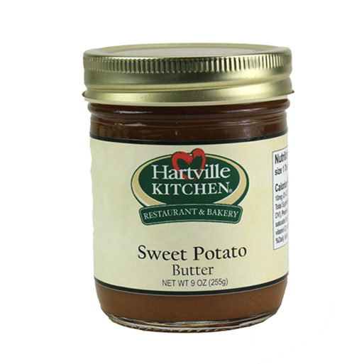 Glass jar of Hartville Kitchen sweet potato butter with gold lid in jams and jellies and food beverage collections