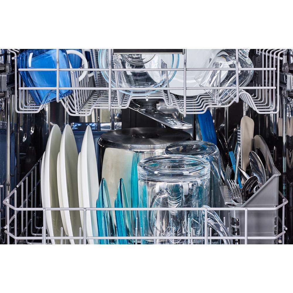 Open dishwasher interior with glassware, plates, utensils, and cookware in kitchen appliances and dishwashers category
