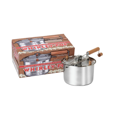 Stainless steel popcorn popper with wooden handle and crank next to vintage-style cardboard packaging for home use