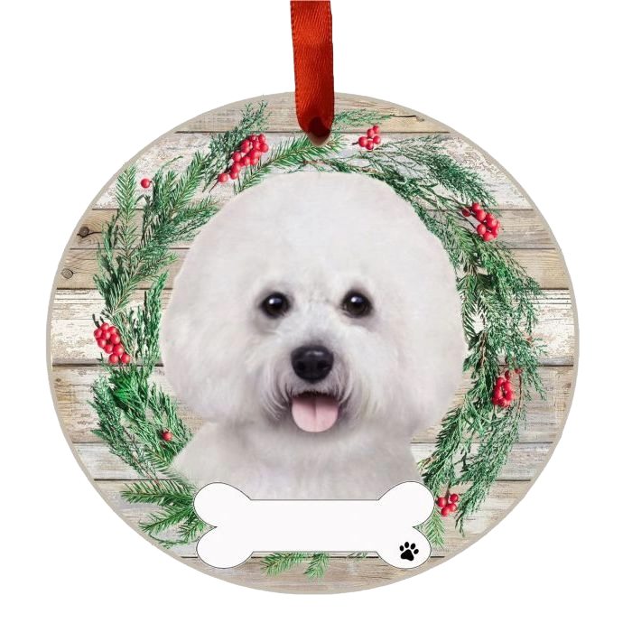 Round Christmas ornament with a Bichon Frise face surrounded by a festive wreath and red berries decoration