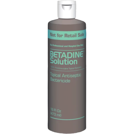 Plastic bottle of Betadine antiseptic solution with blue-green labeling for topical bactericide use