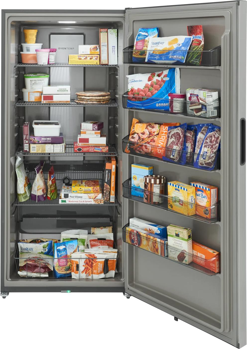Open upright freezer filled with assorted frozen foods including vegetables, seafood, snacks, and prepared meals, showcasing organized storage inside Freezers & Ice Makers and Kitchen & Kitchenware collections.