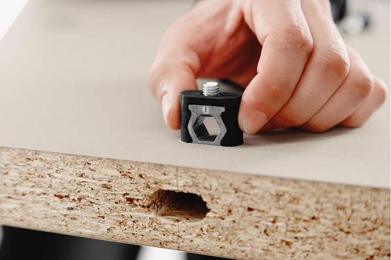 Hand positioning Festool Domino Connector Extension Shell for securing wood joints in woodworking tool and home improvement accessories collections
