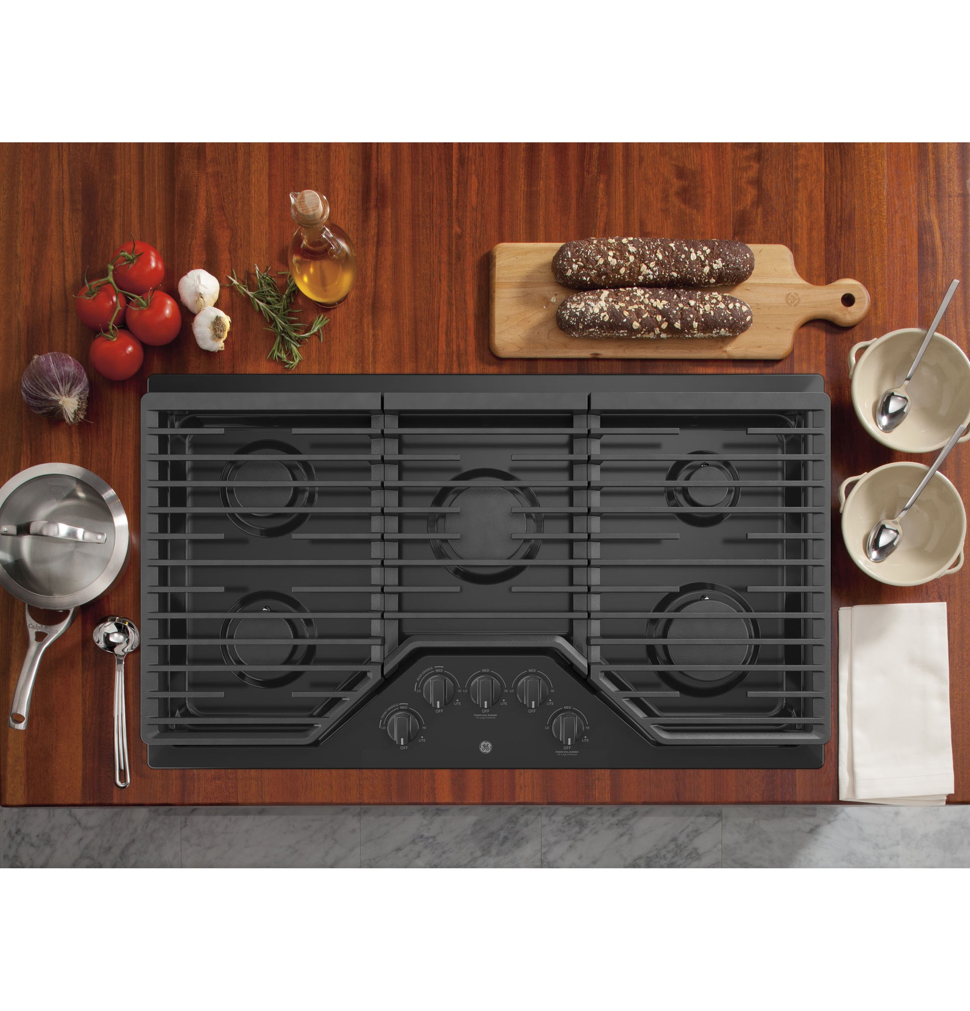 Top view of black 5-burner built-in gas cooktop with dishwasher safe grates for kitchen and gas cooktops collection