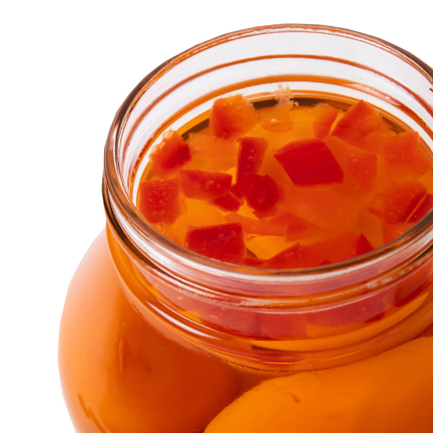 Open glass jar filled with spicy pickled eggs and red pepper chunks for fruits and vegetables under $50 collection