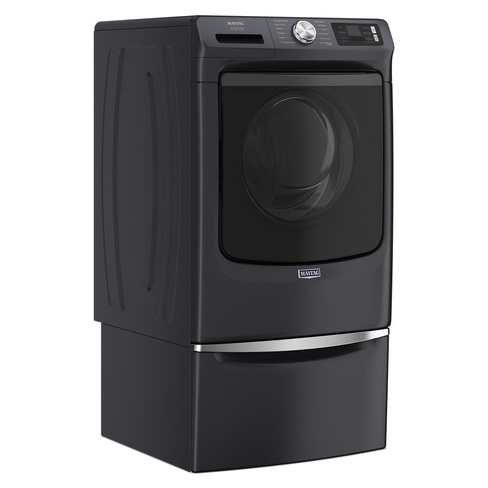 Dark front load washer with digital controls elevated on a matching pedestal drawer from Appliance Parts & Accessories collection