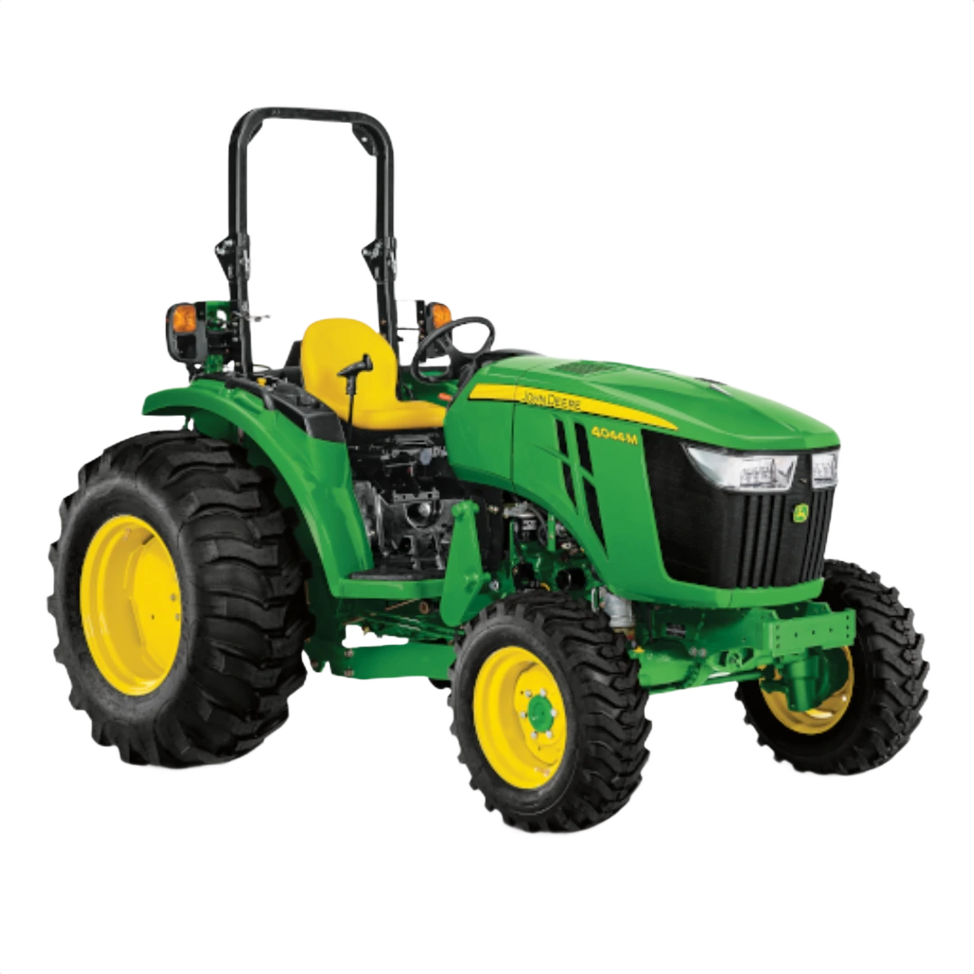 Green John Deere 4044M compact tractor with yellow seat, rugged treaded tires, and rollover protection, featured in Outdoor Power Equipment at Hartville Hardware.