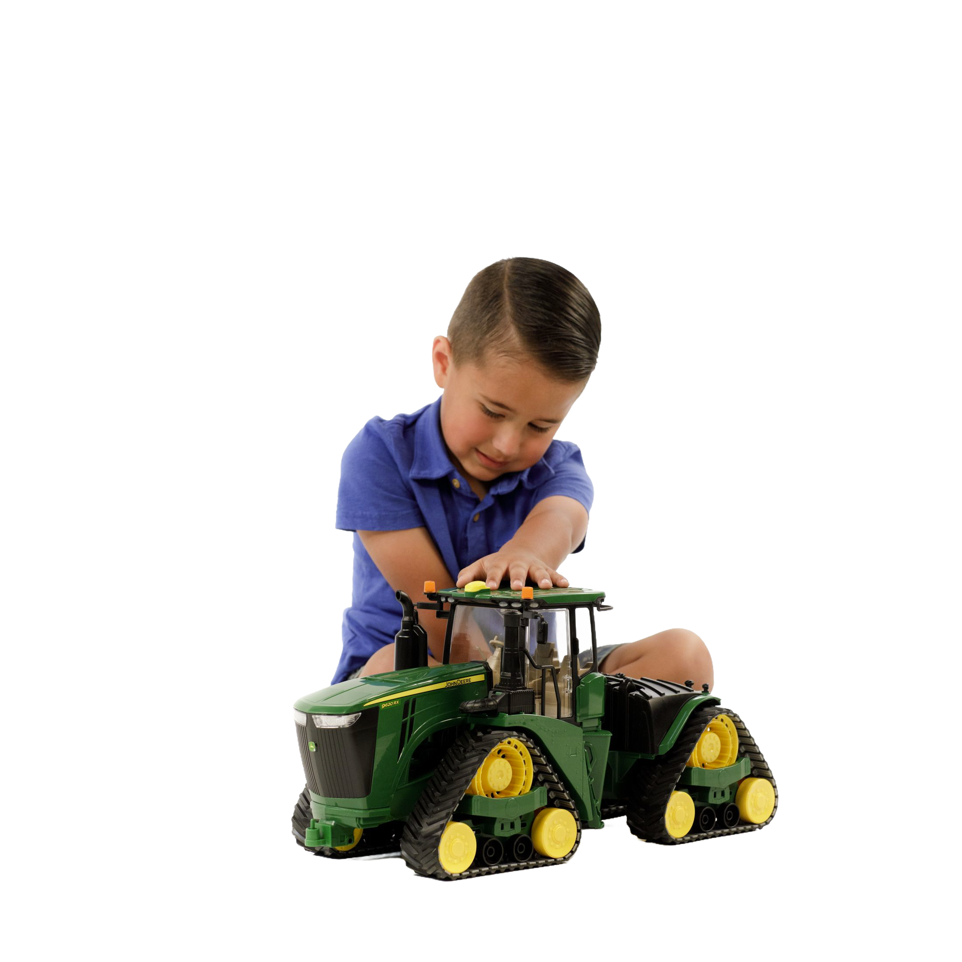 Child playing with green and yellow Bruder John Deere 9620RX toy tractor from Vehicles & Remote Controlled Toys collection