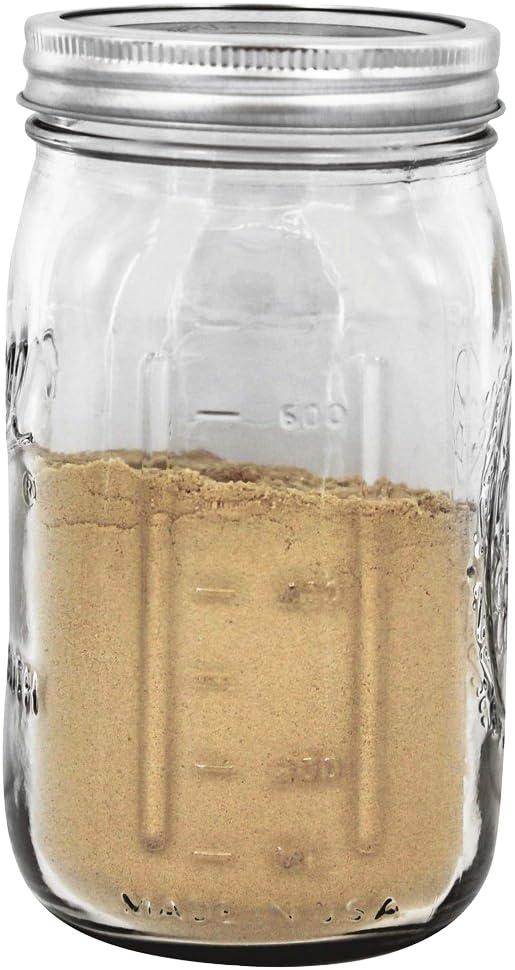 Clear wide mouth quart jar with silver metal lid filled with light brown powder in kitchenware collection under $50