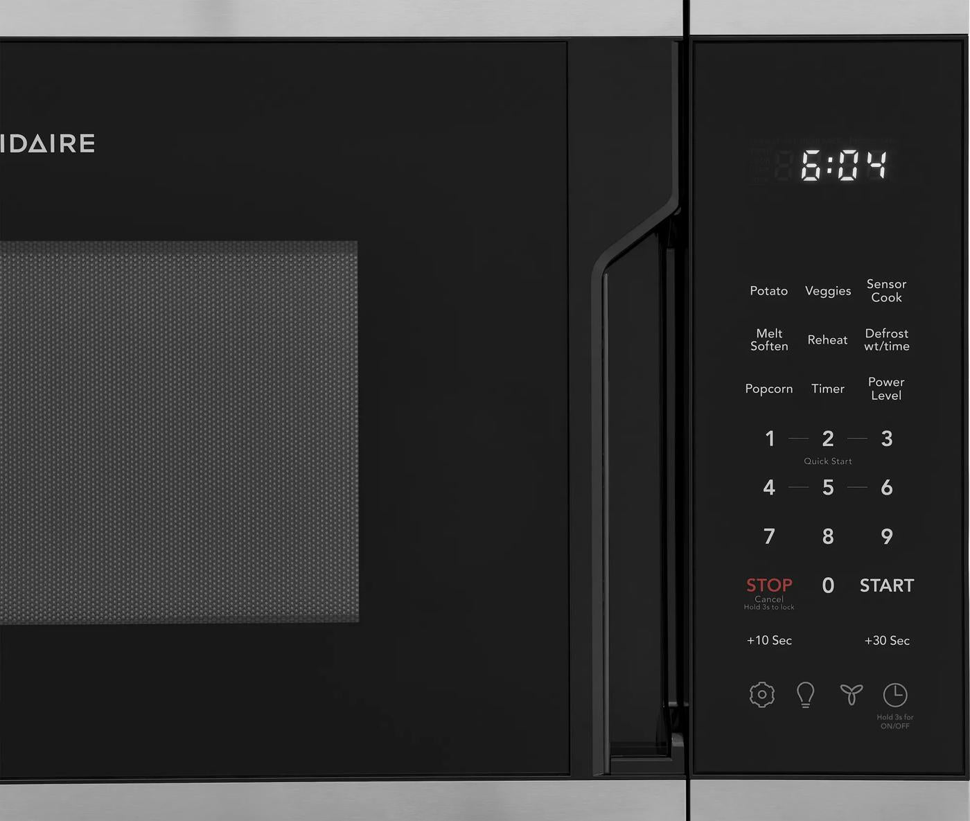 Close-up of black 1.8 cu. ft. over-the-range microwave control panel with digital clock and sensor cook features