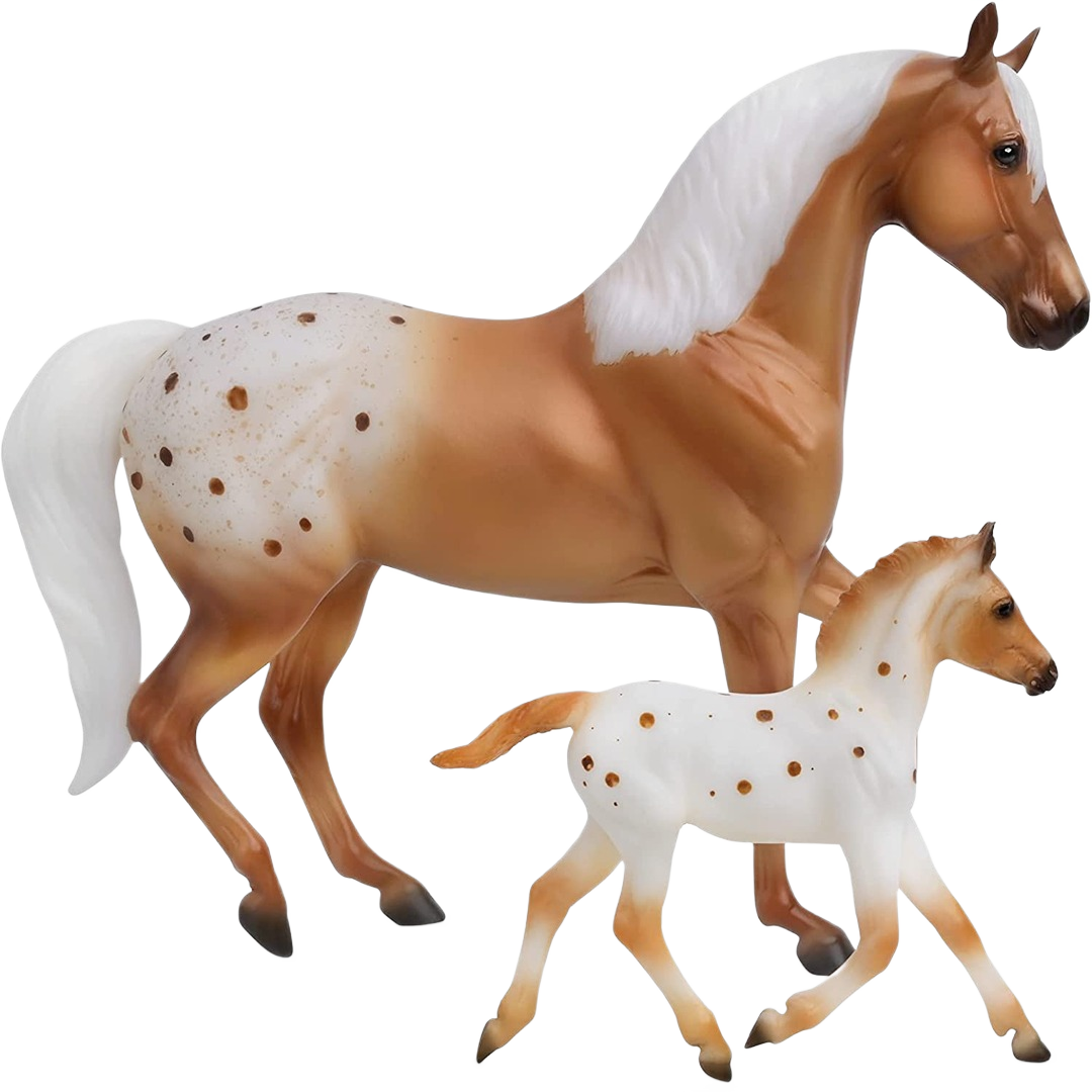 Tan and white horse and foal figurines with spotted patterns and white manes in a walking pose