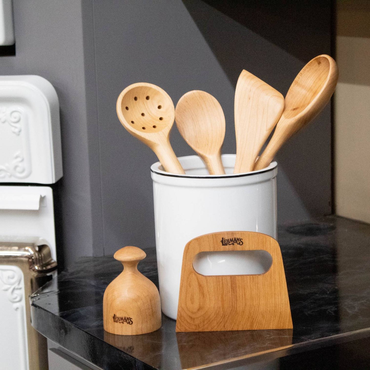 Handmade solid American Hard Maple wooden spoons and utensils in white crock on kitchen counter under $50 kitchenware collection