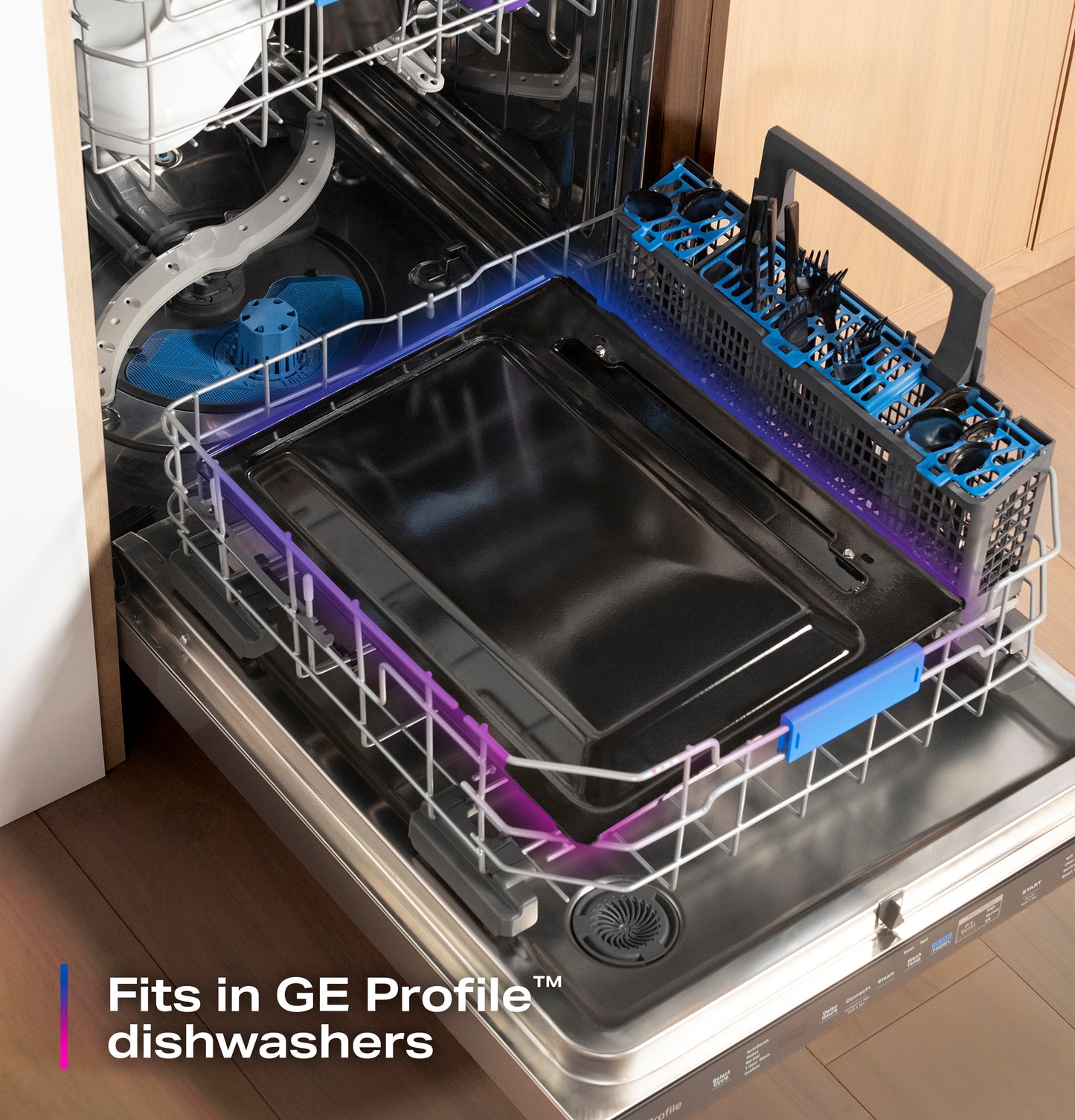 EasyWash oven tray loaded in open dishwasher rack with utensil holder in modern kitchen setting