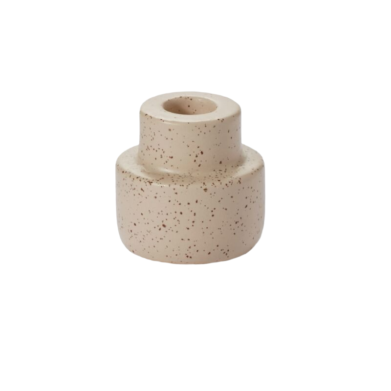 Speckled off-white ceramic candleholder with smooth matte finish for decorative home accents and tabletop styling
