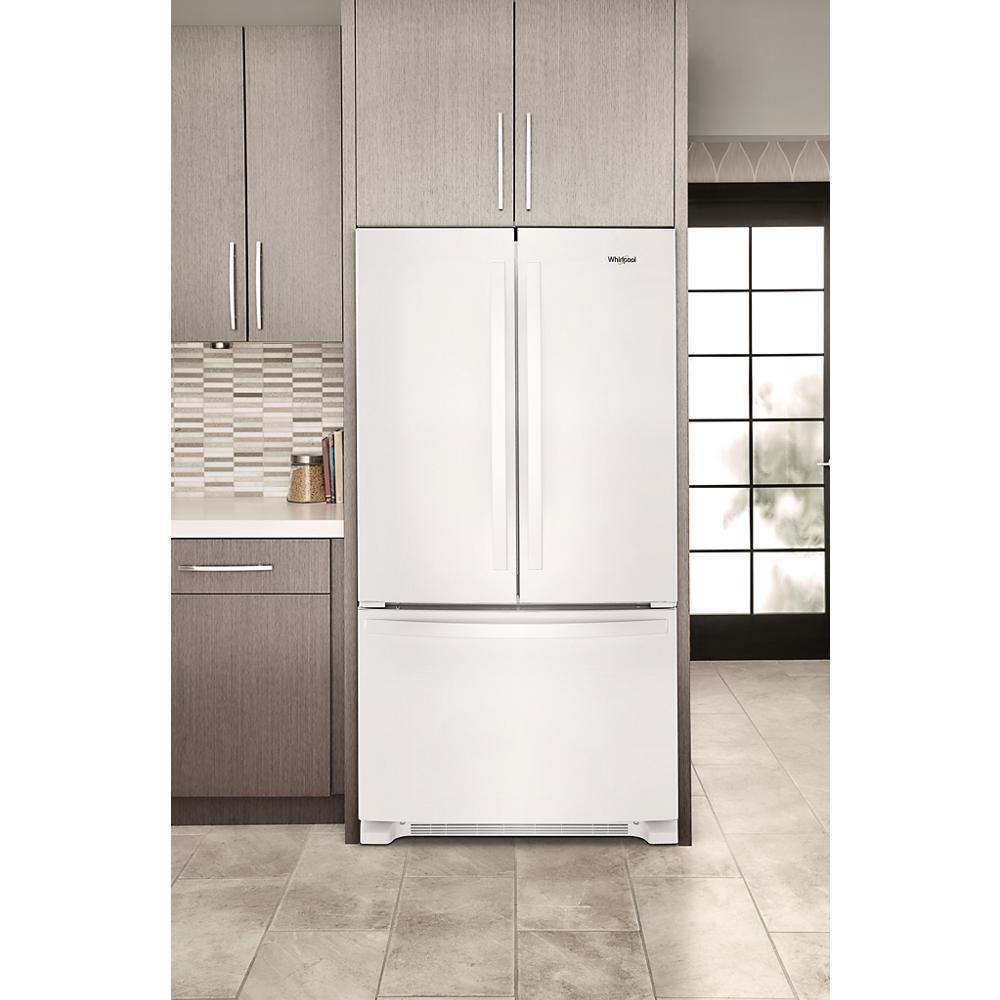 White 36-inch wide Whirlpool French door refrigerator with bottom freezer in modern kitchen from Refrigerators collection