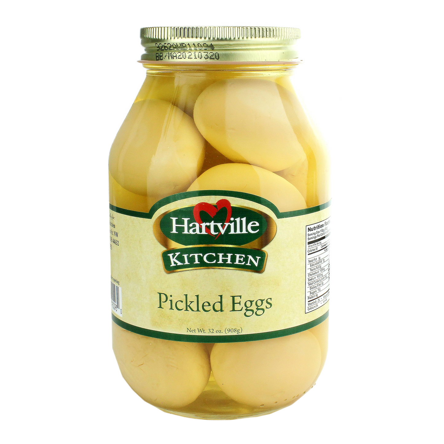 Clear glass jar filled with whole pickled eggs in brine, labeled Hartville Kitchen Pickled Eggs 32 oz.