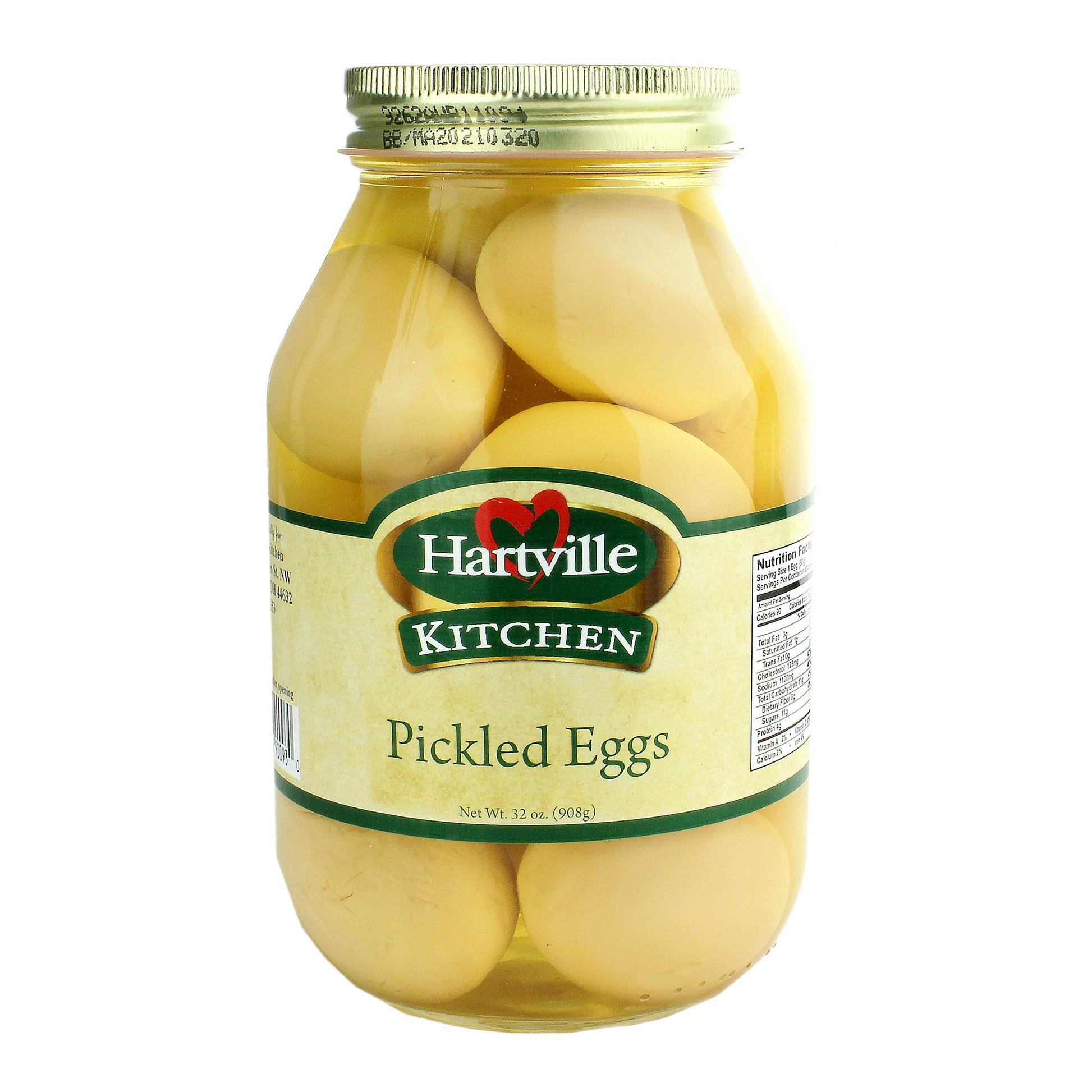 Clear glass jar filled with whole pickled eggs in brine, labeled Hartville Kitchen Pickled Eggs 32 oz.
