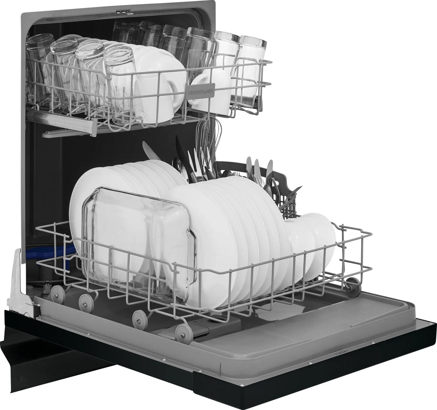 Open built-in dishwasher with upper and lower racks loaded with white dishes and glassware, part of kitchen appliances collection