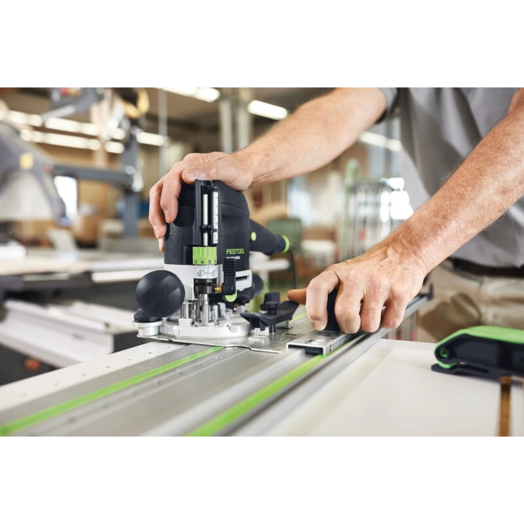 Person using Festool router with guide rail for precise woodworking under power tool and woodworking tool accessories collections