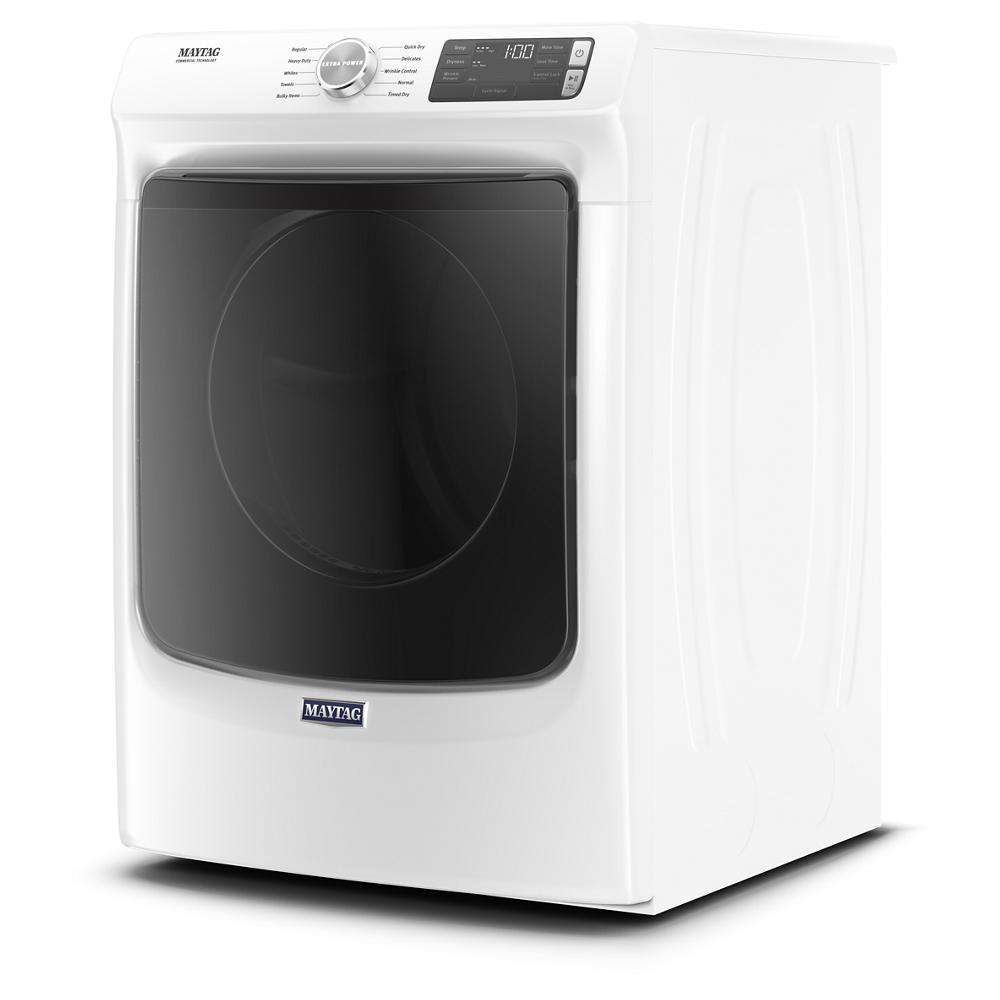 White front load electric dryer with dark glass door and digital control panel in home appliance category