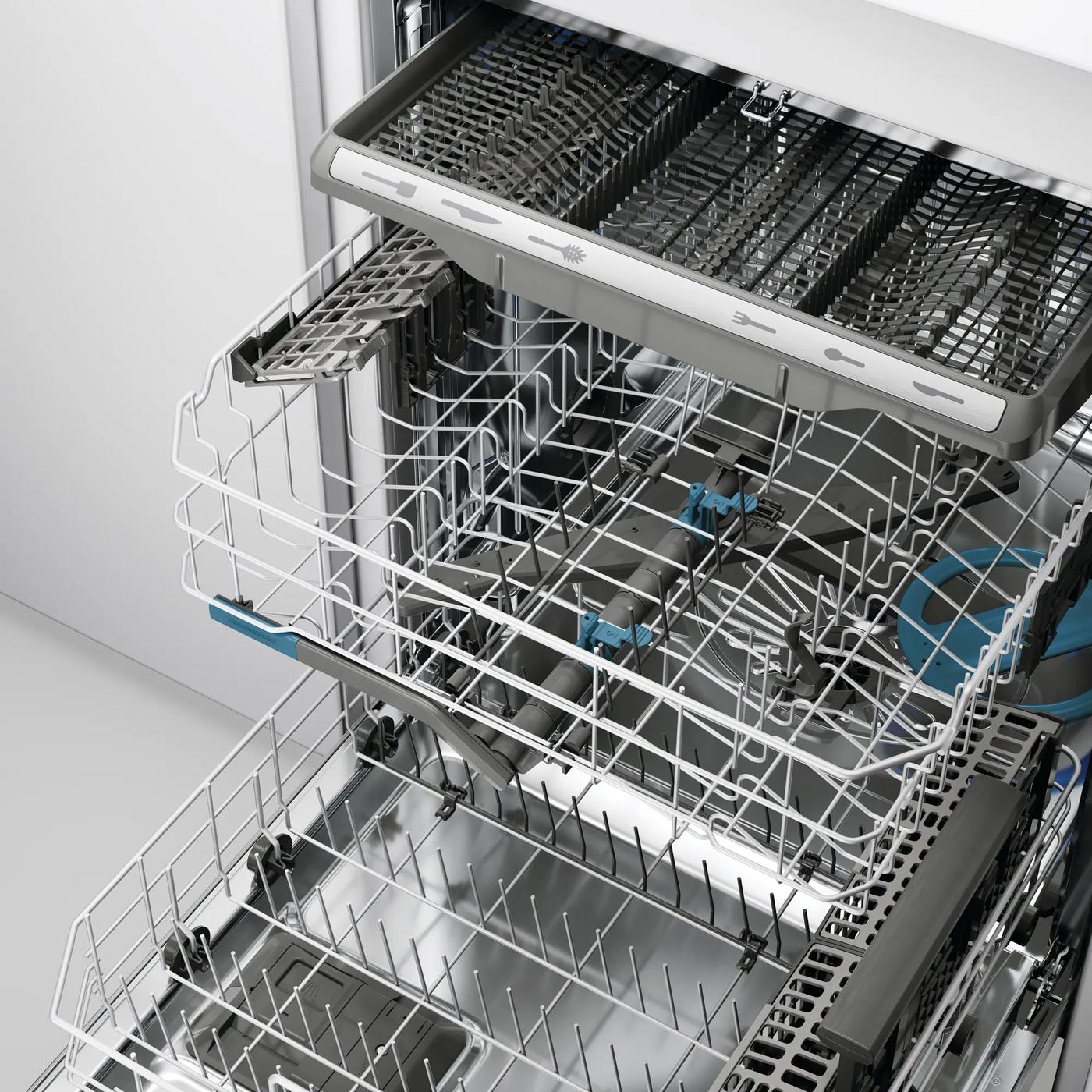 Interior view of 24" stainless steel tub built-in dishwasher with open racks and utensil holder from dishwashers collection