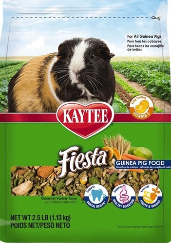 Green and red package of Kaytee Fiesta guinea pig food featuring a close-up image of a tricolor guinea pig