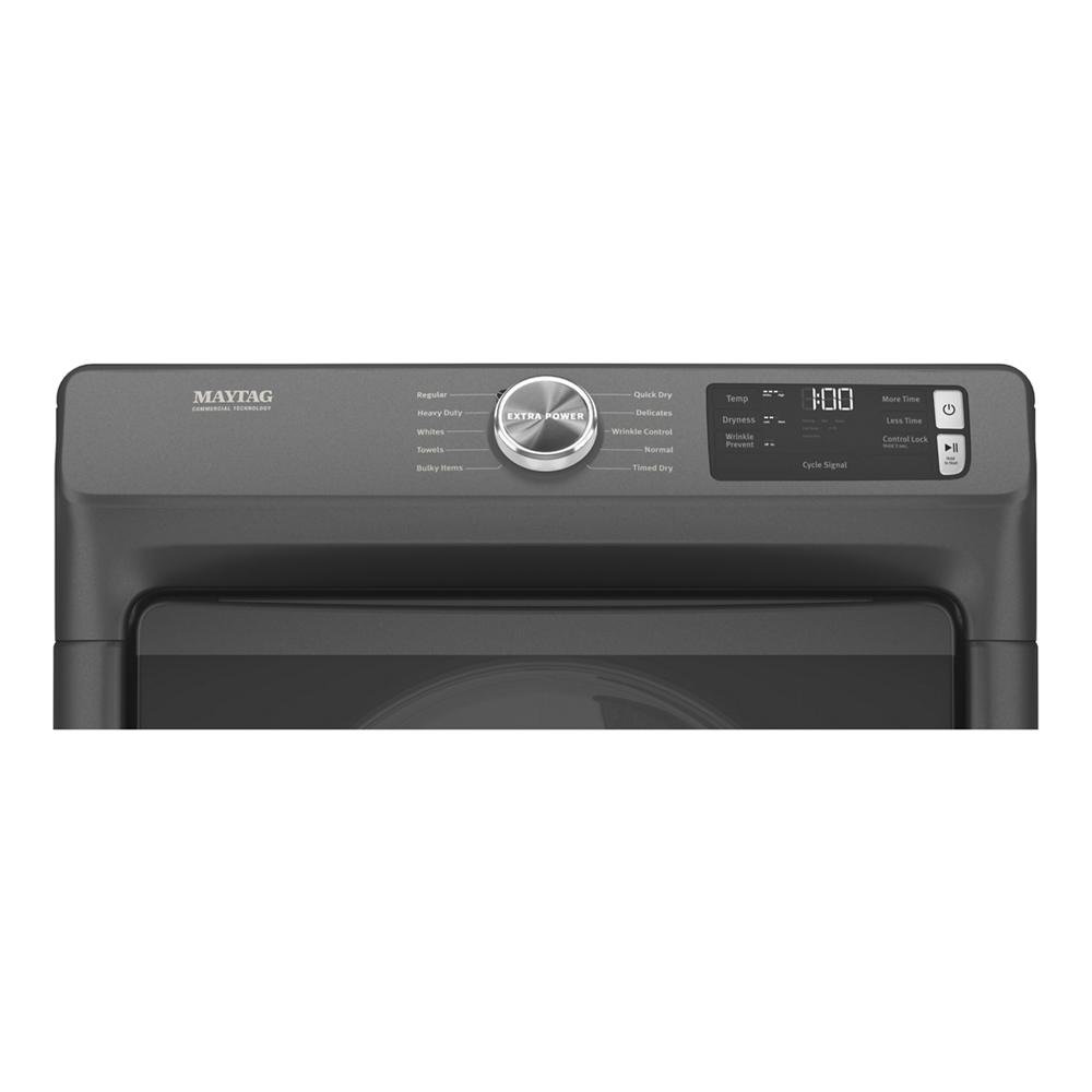 Control panel close-up of matte black front load electric dryer with digital display and cycle selector knob in appliance setting