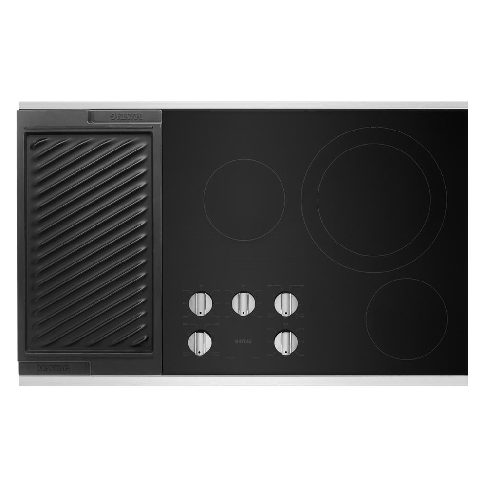 Electric cooktop with four heating elements and a reversible grill and griddle for kitchen appliance collections