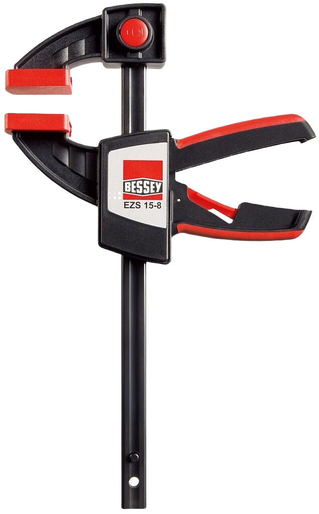 Black and red quick-release clamp with ergonomic handle for woodworking and home improvement tasks
