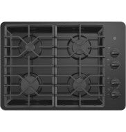 Top-down view of black built-in gas cooktop with four burners and dishwasher-safe grates in kitchen appliances collection