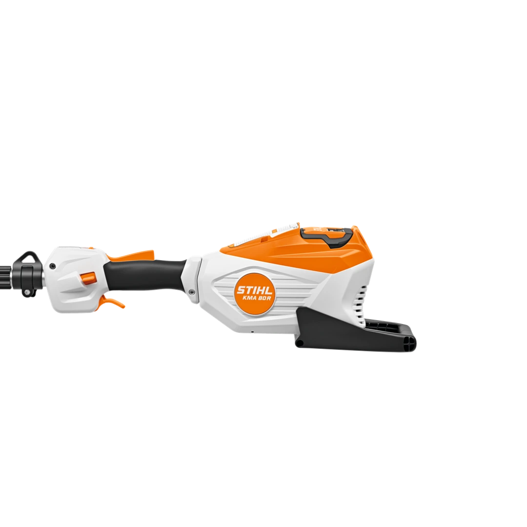 Compact battery-powered KombiMotor in white and orange for outdoor power tools, part of STIHL's lawn and garden equipment.