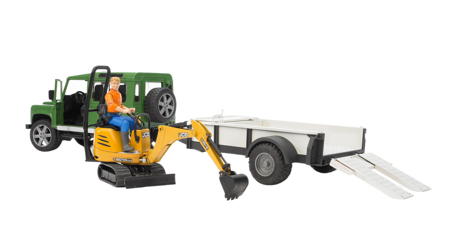 Green Land Rover Defender toy attached to white trailer carrying detailed yellow JCB micro excavator from Bruder Toys collection