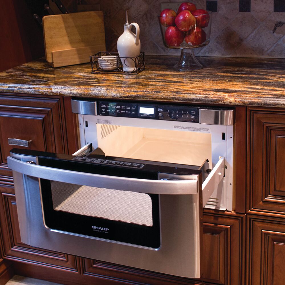 Built-in stainless steel microwave drawer open under granite countertop in kitchen appliances and microwave drawers collection