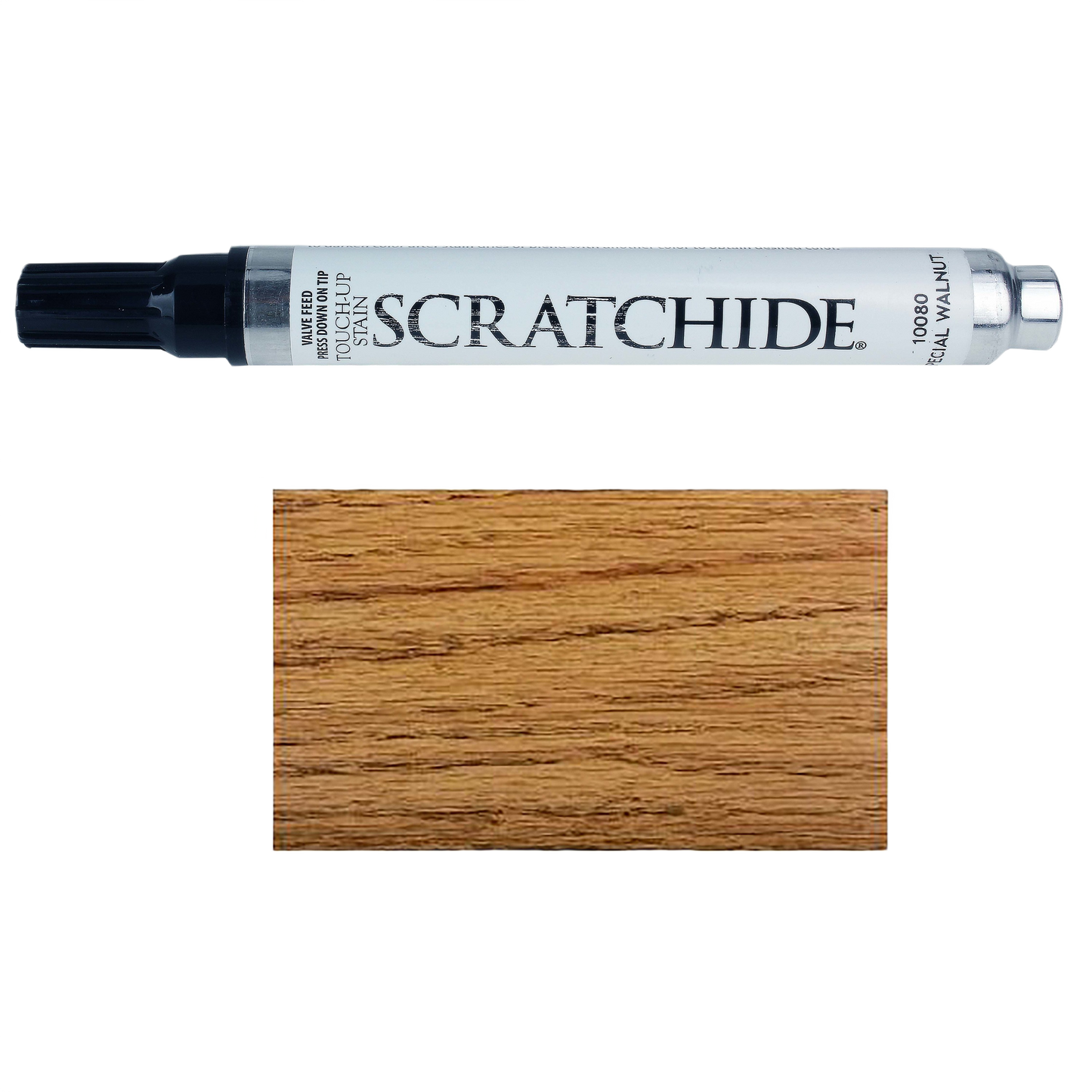 Wood touch-up pen with black cap next to golden oak wood grain sample for home improvement use