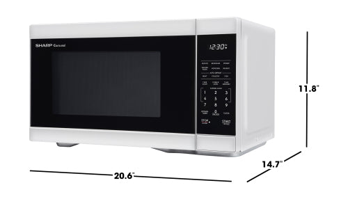 White countertop microwave oven with digital control panel and preset cooking buttons in microwaves and kitchen appliances collection