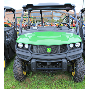 Front view of green full-size crossover utility vehicle with rugged off-road segments for terrain and outdoor work use