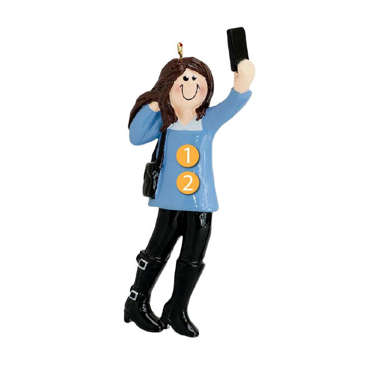 Happy female ornament wearing blue top and black boots taking selfie with phone from Christmas Ornaments & Tree Decorations collection